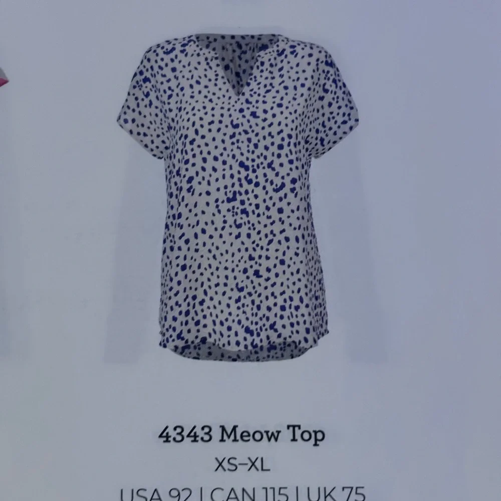 CAbi Meow Top 4343 Size Medium Cream and Purple Patterned Blouse - Picture 2 of 6